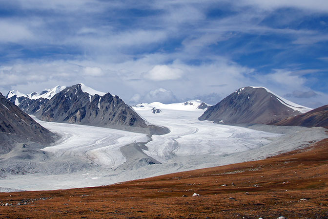 The Majestic Peril of Potanini Glacier: A Frozen Drama in Nature